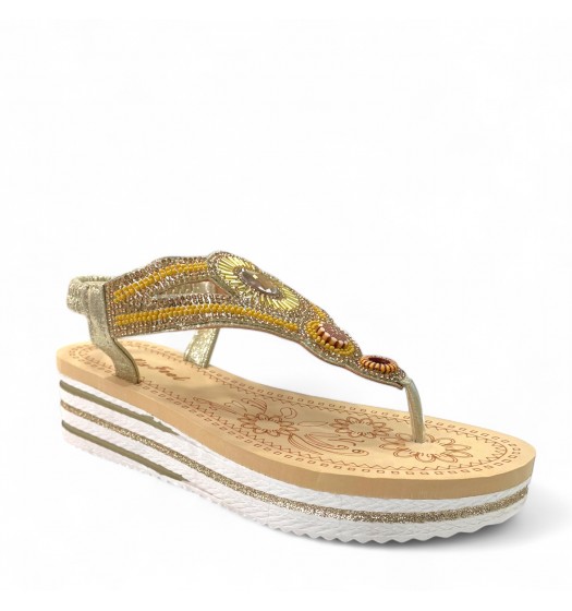 Thong platform sandals in Gold