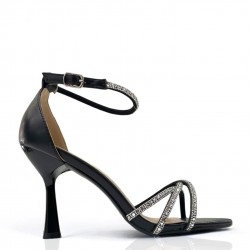 Heeled sandals with crossed straps in Black