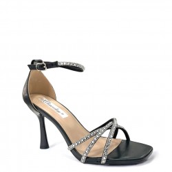 Heeled sandals with crossed straps in Black