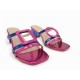 Mules with asymmetrical details in Fuchsia